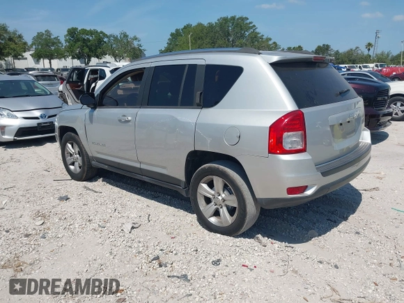 2012 Jeep Compass Sport with VIN 1C4NJCBA7CD660091, listed as a IAAI auction lot 42113038 with 123,181 mi miles. Bid and sale history available at carsss.com. Image 3.