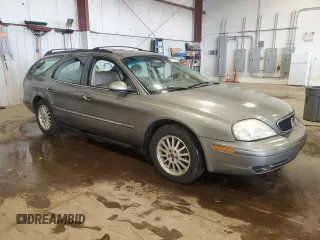 2002 Mercury Sable with VIN 1MEFM58U82G612541, listed as a Copart auction lot 60254405 with 171,854 mi miles and Salvage title. Bid and sale history available at DreamBid. Image 4.