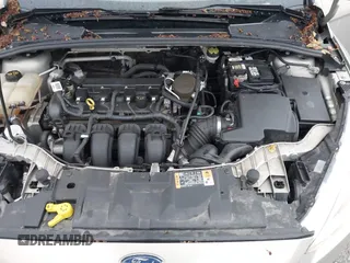 2015 Ford Focus SE with VIN 1FADP3F21FL376579, listed as a IAAI auction lot 41972088 with 129,593 mi miles. Bid and sale history available at carsss.com. Image 10.