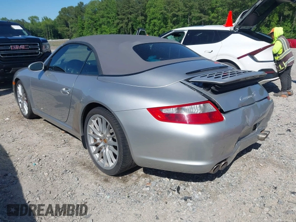 2006 Porsche 911 Carrera S z VIN WP0CB29976S766616, wystawiony jako IAAI lot #42119525 z przebiegiem 57 164 mil mil oraz . Historia ofert i sprzedaży dostępna na DreamBid. Obrazek 3.