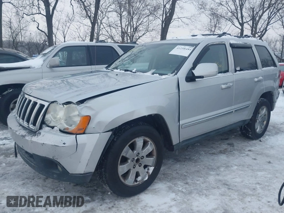 2008 Jeep Grand Cherokee with VIN 1J8HS58M58C117397, listed as a IAAI auction lot 41298484 with 208,095 mi miles and . Bid and sale history available at DreamBid. Image 6.