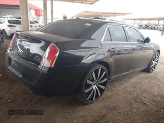 2012 Chrysler 300 S with VIN 2C3CCABGXCH313095, listed as a IAAI auction lot 41789401 with 186,302 mi miles and . Bid and sale history available at carsss.com. Image 4.