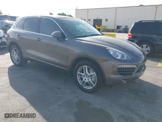 2011 Porsche Cayenne S Hybrid with VIN WP1AE2A29BLA94414, listed as a IAAI auction lot 41644386 with 76,095 mi miles. Bid and sale history available at carsss.com. Image 1.