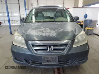 2005 Honda Odyssey EX-L z VIN 5FNRL38765B134604, wystawiony jako Copart lot #60455195 z przebiegiem 191 705 mil mil oraz Czysty tytuł • Clean title. Historia ofert i sprzedaży dostępna na DreamBid. Obrazek 5.