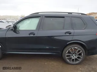 2025 BMW X7 M60i with VIN 5UX33EM08S9X65854, listed as a IAAI auction lot 41689675 with 2,595 mi miles. Bid and sale history available at carsss.com. Image 14.