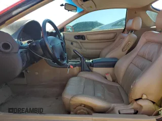 1999 Mitsubishi 3000GT z VIN JA3AM44H2XY001614, wystawiony jako Copart lot #77580444 z przebiegiem 128 948 mil mil oraz Tytuł czysty. Historia ofert i sprzedaży dostępna na DreamBid. Obrazek 7.