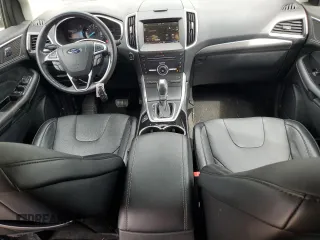 2015 Ford Edge Titanium z VIN 2FMTK4K84FBB09582, wystawiony jako Copart lot #55801915 z przebiegiem 72 533 mil mil oraz Szkoda całkowita • Salvage title. Historia ofert i sprzedaży dostępna na DreamBid. Obrazek 8.