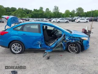 2015 Ford Focus SE z VIN 1FADP3F26FL252212, wystawiony jako IAAI lot #42345763 z przebiegiem 102 549 mil mil oraz . Historia ofert i sprzedaży dostępna na DreamBid. Obrazek 13.