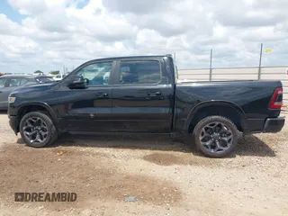 2023 Ram 1500 Limited with VIN 1C6SRFHT6PN541655, listed as a IAAI auction lot 42143725 with 52,793 mi miles and . Bid and sale history available at DreamBid. Image 14.