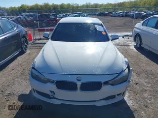 2015 BMW 3 Series 320i with VIN WBA3B1G57FNT02019, listed as a IAAI auction lot 42128277 with 218,621 mi miles and . Bid and sale history available at DreamBid. Image 13.