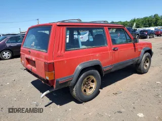 1995 Jeep Cherokee Sport with VIN 1J4FJ67S6SL549912, listed as a Copart auction lot 61104474 with 296,507 mi miles and Clean Title. Bid and sale history available at carsss.com. Image 3.