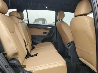 2023 Volkswagen Tiguan SE z VIN 3VVNB7AX0PM100371, wystawiony jako Copart lot #51858375 z przebiegiem 46 940 mil mil oraz Szkoda całkowita • Salvage title. Historia ofert i sprzedaży dostępna na DreamBid. Obrazek 11.