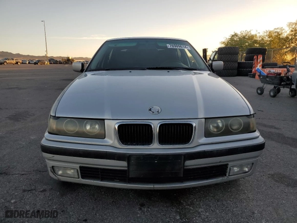 1998 BMW 3-Series 318TI with VIN WBACG8329WKC84200, listed as a Copart auction lot 76909614 with NaN miles and Clean Title. Bid and sale history available at carsss.com. Image 5.