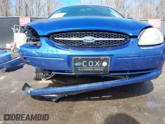 2003 Ford Taurus SE Standard with VIN 1FAFP53233G208763, listed as a IAAI auction lot 41661923 with 127,830 mi miles. Bid and sale history available at carsss.com. Image 18.