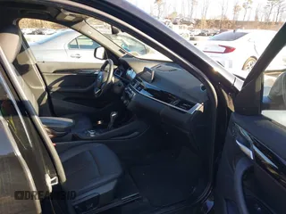 2018 BMW X1 xDrive28i with VIN WBXHT3C36J5L29746, listed as a IAAI auction lot 41547100 with 103,420 mi miles and . Bid and sale history available at DreamBid. Image 5.