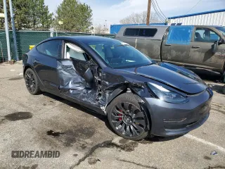2023 Tesla Model 3 Performance z VIN 5YJ3E1EC2PF673505, wystawiony jako Copart lot #51285665 z przebiegiem 12 019 mil mil oraz Szkoda całkowita • Salvage title. Historia ofert i sprzedaży dostępna na DreamBid. Obrazek 4.