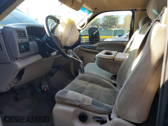 2001 Ford F-250 XL with VIN 1FTNX21SX1EA80232, listed as a Copart auction lot 56067955 with 188,119 mi miles and Salvage title. Bid and sale history available at DreamBid. Image 7.