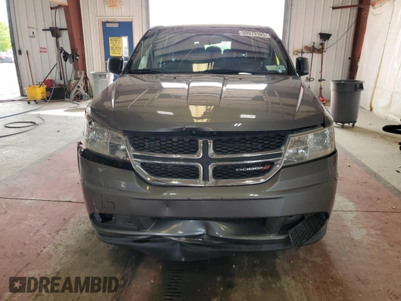 2013 Dodge Journey American Value with VIN 3C4PDCABXDT541764, listed as a Copart auction lot 59919185 with 152,383 mi miles and Salvage title. Bid and sale history available at DreamBid. Image 5.