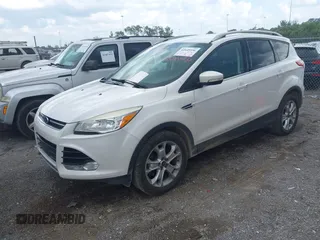 2015 Ford Escape Titanium with VIN 1FMCU0J99FUB92563, listed as a IAAI auction lot 42649556 with 183,199 mi miles and . Bid and sale history available at DreamBid. Image 2.