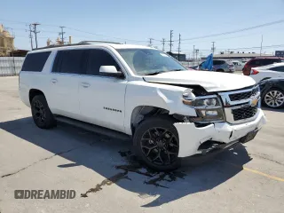2017 Chevrolet Suburban LS с VIN 1GNSCGKC8HR305762, выставлен на аукционе Copart как лот 57514275 с пробегом 111 928 миль миль и Списание • Salvage title. История ставок и продаж доступна на DreamBid. Изображение 4.