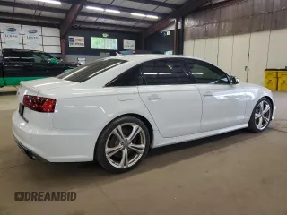 2016 Audi S6 Premium Plus z VIN WAUF2AFCXGN014946, wystawiony jako Copart lot #56903155 z przebiegiem 103 025 mil mil oraz Tytuł czysty. Historia ofert i sprzedaży dostępna na DreamBid. Obrazek 3.