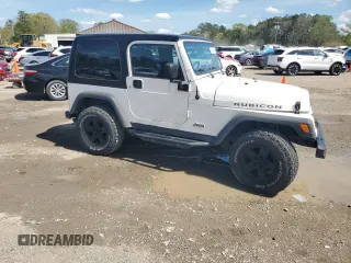 2003 Jeep Wrangler Rubicon z VIN 1J4FA69S73P333199, wystawiony jako Copart lot #50602615 z przebiegiem 133 254 mil mil oraz Szkoda całkowita • Salvage title. Historia ofert i sprzedaży dostępna na DreamBid. Obrazek 4.