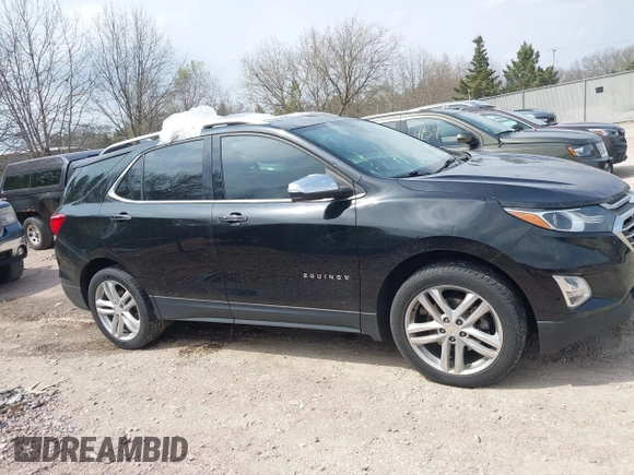 2019 Chevrolet Equinox Premier z VIN 2GNAXYEX5K6143922, wystawiony jako IAAI lot #42134219 z przebiegiem 105 496 mil mil oraz . Historia ofert i sprzedaży dostępna na DreamBid. Obrazek 13.