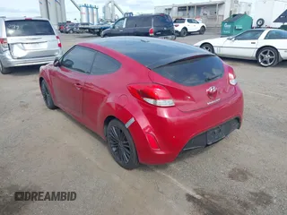 2012 Hyundai Veloster w/Black Int with VIN KMHTC6AD8CU053904, listed as a IAAI auction lot 42774621 with 164,599 mi miles and . Bid and sale history available at DreamBid. Image 3.