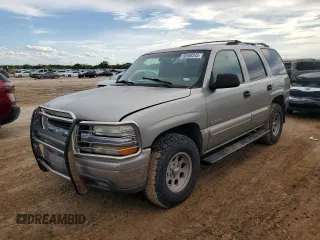 2000 Chevrolet Tahoe LT with VIN 1GNEK13T7YJ142712, listed as a Copart auction lot 50588245 with 336,210 mi miles and Salvage title. Bid and sale history available at DreamBid. Image 1.