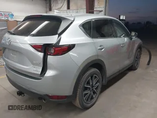2018 Mazda CX-5 Grand Touring with VIN JM3KFBDM7J0316892, listed as a IAAI auction lot 41885705 with 90,386 mi miles. Bid and sale history available at carsss.com. Image 4.