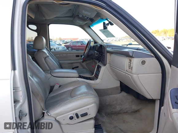 2004 Cadillac Escalade z VIN 1GYEC63T64R231552, wystawiony jako IAAI lot #41428401 z przebiegiem 275 724 mil mil oraz . Historia ofert i sprzedaży dostępna na DreamBid. Obrazek 5.