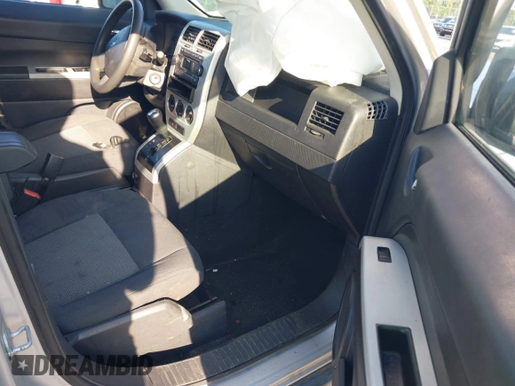 2008 Jeep Patriot Sport with VIN 1J8FT28W08D589442, listed as a IAAI auction lot 42063006 with 265,904 mi miles. Bid and sale history available at carsss.com. Image 5.
