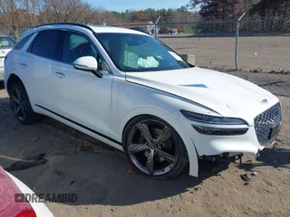 2022 Genesis GV70 Sport z VIN KMUMCDTC1NU035343, wystawiony jako IAAI lot #40788562 z przebiegiem Nie podano mil oraz . Historia ofert i sprzedaży dostępna na DreamBid. Obrazek 1.