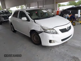 2010 Toyota Corolla z VIN 1NXBU4EE5AZ305122, wystawiony jako IAAI lot #42431076 z przebiegiem 211 023 mil mil oraz . Historia ofert i sprzedaży dostępna na DreamBid. Obrazek 1.