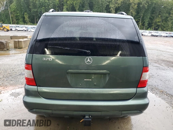 2002 Mercedes-Benz M-Class with VIN 4JGAB54EX2A313793, listed as a Copart auction lot 72600614 with 140,053 mi miles and Salvage Title. Bid and sale history available at carsss.com. Image 6.