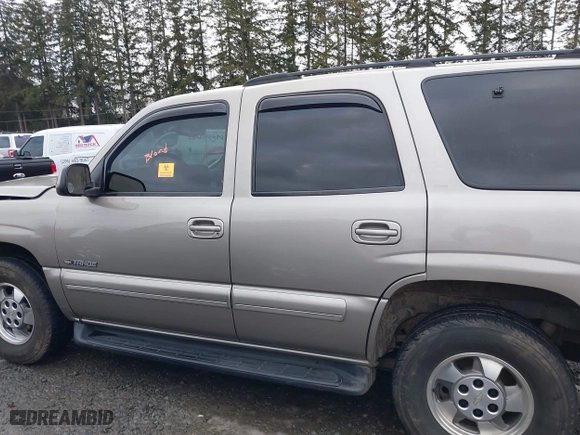 2001 Chevrolet Tahoe LS with VIN 1GNEK13TX1J213942, listed as a IAAI auction lot 41568563 with 130,647 mi miles. Bid and sale history available at carsss.com. Image 14.