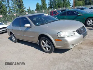 2000 Nissan Maxima GXE z VIN JN1CA31D8YT553912, wystawiony jako IAAI lot #42405184 z przebiegiem 108 855 mil mil oraz . Historia ofert i sprzedaży dostępna na DreamBid. Obrazek 1.