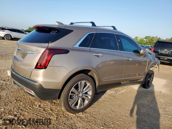 2022 Cadillac XT5 Premium Luxury FWD z VIN 1GYKNERS9NZ120517, wystawiony jako Copart lot #58978045 z przebiegiem 31 456 mil mil oraz Szkoda całkowita • Salvage title. Historia ofert i sprzedaży dostępna na DreamBid. Obrazek 3.