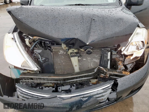 2009 Nissan Versa S with VIN 3N1BC13E99L484430, listed as a Copart auction lot 54484725 with 86,619 mi miles and Salvage Title. Bid and sale history available at DreamBid. Image 11.