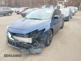 2016 Nissan Maxima Platinum z VIN 1N4AA6AP4GC414364, wystawiony jako IAAI lot #40738491 z przebiegiem 97 889 mil mil oraz . Historia ofert i sprzedaży dostępna na DreamBid. Obrazek 2.