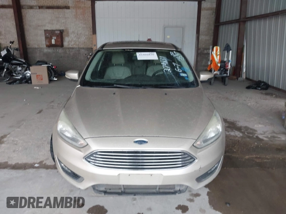 2017 Ford Focus Titanium with VIN 1FADP3J26HL279839, listed as a IAAI auction lot 42466826 with 202,795 mi miles and . Bid and sale history available at DreamBid. Image 12.