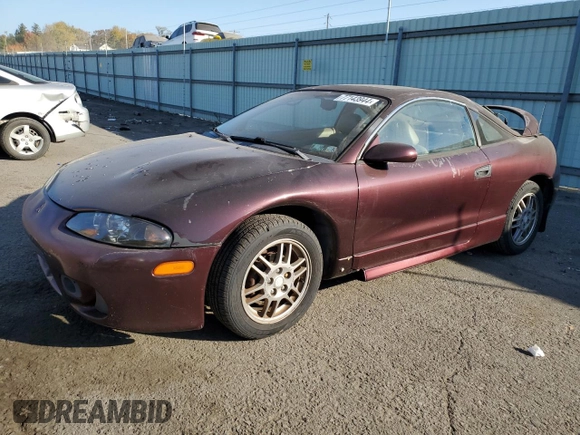 1999 Mitsubishi Eclipse with VIN 4A3AK44Y1XE074155, listed as a Copart auction lot 77143944 with 105,262 mi miles and Clean Title. Bid and sale history available at DreamBid. Image 1.