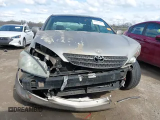 2003 Toyota Camry LE with VIN 4T1BE32KX3U123873, listed as a IAAI auction lot 42085492 with 166,901 mi miles and . Bid and sale history available at DreamBid. Image 6.