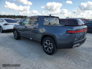 2022 Rivian R1T Adventure Package with VIN 7FCTGAAA2NN007543, listed as a Copart auction lot 77356644 with 0 mi miles and Non Repairable. Bid and sale history available at carsss.com. Image 2.