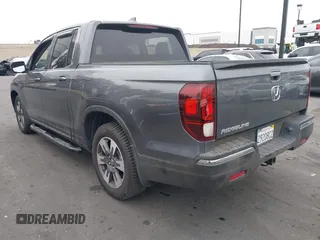 2017 Honda Ridgeline RTL-T with VIN 5FPYK2F67HB002854, listed as a IAAI auction lot 41895895 with 86,882 mi miles and . Bid and sale history available at DreamBid. Image 3.