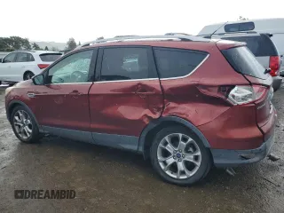 2016 Ford Escape Titanium with VIN 1FMCU9J91GUA99767, listed as a Copart auction lot 51172655 with 132,911 mi miles and Salvage title. Bid and sale history available at DreamBid. Image 2.