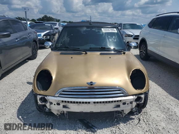 2005 MINI Convertible with VIN WMWRF334X5TG11889, listed as a Copart auction lot 55567995 with 169,717 mi miles and Salvage title. Bid and sale history available at DreamBid. Image 5.