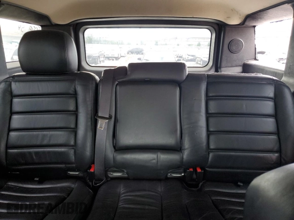 2006 Hummer H2 with VIN 5GRGN23U46H115817, listed as a Copart auction lot 73933564 with 128,671 mi miles and Salvage Title. Bid and sale history available at carsss.com. Image 10.