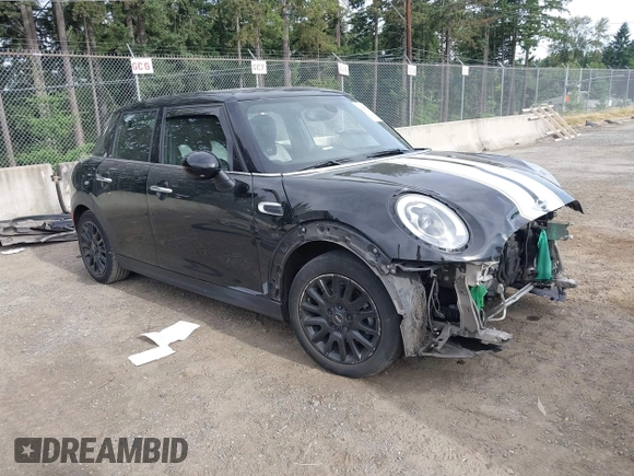 2015 MINI Hardtop 4 Door with VIN WMWXS5C58FT833420, listed as a IAAI auction lot 42560244 with 115,446 mi miles and . Bid and sale history available at DreamBid. Image 1.