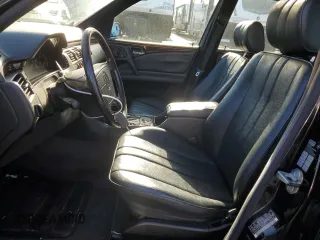 1996 Mercedes-Benz E Class with VIN WDBJF20F9TJ023003, listed as a Copart auction lot 86356784 with 230,944 mi miles and Salvage Title. Bid and sale history available at carsss.com. Image 7.